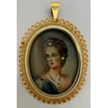 An 18ct gold framed portrait cameo pendant/ brooch set with 3 diamonds. 8gm total weight.Condition