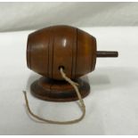 Treen string holder in the form of a barrel, complete with inner reel 7cms h.Condition ReportCrack