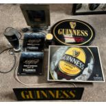 A quantity of Guinness signage to include 5 light up. Guinness foreign extra sign 42 x 60cm. (8)
