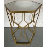 A metal framed hexagon side table with mirror top. Top 45cm d x 85cm h.Condition ReportGood.