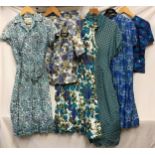 A selection of vintage clothing to include a blue cotton print top, pinafore style blue dress, linen