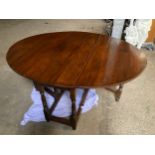 An oak gateleg dining table 150 w x 122cm open, closed 46 x 75cm h.Condition ReportTop repolished.