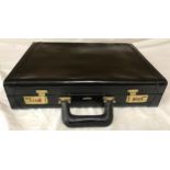 Antler black leather attache case with combination lock, number unknown, unlocked. 45.5 w x 16 h x