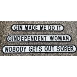 Three vintage style comedic black and white street signs to include 'Gin Made Me Do It', 'Gin