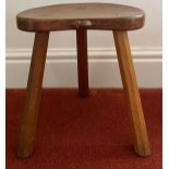 A Robert 'Mouseman' Thompson calf stool, purchased 1977. 35 h x 30cm w.Condition ReportGood