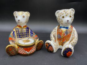 Two Royal Crown Derby Teddy Bears; Drummer Bear with gold coloured stopper 10cm h and Bear with blue