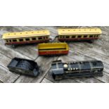 Tin plate train and carriages, Marx Mar Lines to include 3978.Condition ReportFairly good.