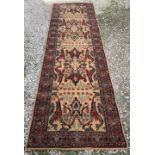 A hall runner rug, Persian pattern, beige and floral design. 300 l x 80cm w.Condition ReportVery