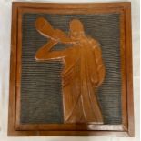 A carved picture from a Wawa tree carved by an Ashanti craftsman, figure depicts a horn blower, 1 of