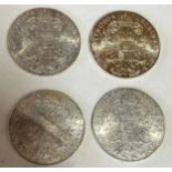 Four Maria Theresa Thaler 1780 coins.