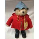 A Vintage 1970's Paddington Bear.Condition ReportPlay worn, discolouration to hat, sleeve and coat.