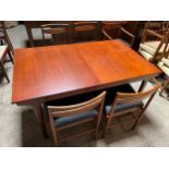 An extending McIntosh table and 5 chairs. Extended 229 l x 91w x 75cm h. Closed 152cm l.Condition