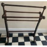 A 19thC mahogany towel rail with twist supports. 67cm w.Condition ReportWater marks to rails.