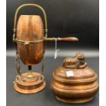 A late 19thC French copper and brass coffee maker together with a 19thC copper tea caddy with