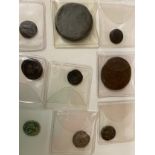 Nine various coins to include Roman and possibly Russian, Middle East.Condition ReportWorn.