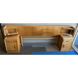 A double G Plan headboard, cupboards to side. 84 h x 221 w x 38cm d.Condition ReportFaded, with wear