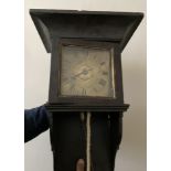 An oak cased hooded wall clock, probably 18thC, 6 inch square brass dial. 54cm h to back, 30 hour