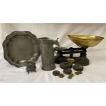 Pewter ware to include a plate 26cm d with London touch mark, a lidded jug with base marks and a