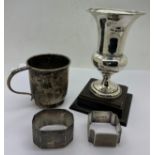 Silver to include mug Sheffield 1960, 7cm h, maker Walker & Hall, 2 silver napkin rings and a silver