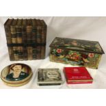 A Huntley and Palmer book form biscuit tin, 16.5 w x 12 d x 16cm h together with a Daintee toffee