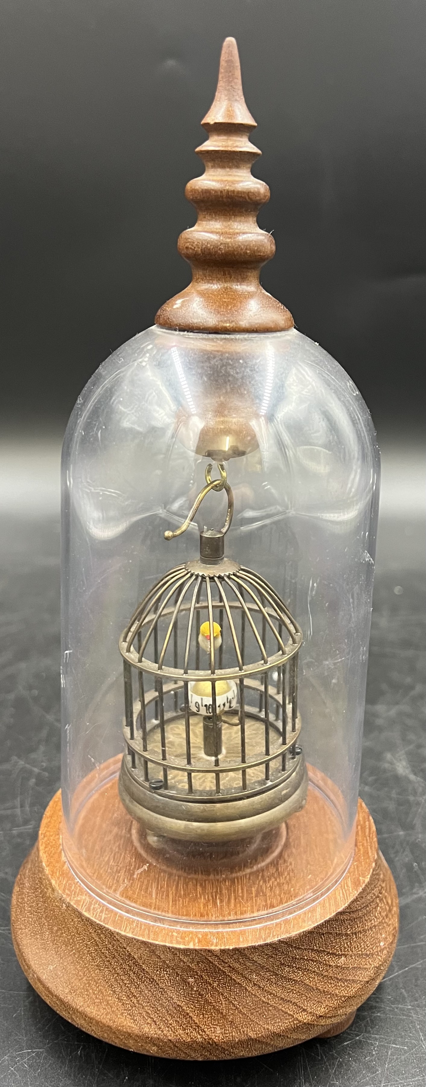 A novelty clock displayed under a clear dome on a wooden base. The vintage style metal birdcage - Image 3 of 4