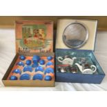Two boxed children's toy tea sets, one Kavin Kupid Products pottery and chrome 8 piece, and the