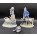 Three pieces of Royal Copenhagen to include 1858 Man with Cattle 22cm h, 694 Lady with Goats 23cm