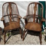 Two 20thC broad arm Windsor armchairs.Condition ReportGood condition.