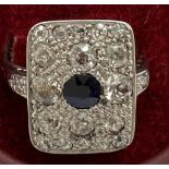 A sapphire cluster and diamond cluster ring. 1.2ct total diamonds. Sapphire 40pts. Size N. 4.4gm