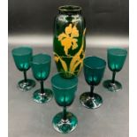 Five 19thC green glasses together with a glass and enamel iris decorated vase 24cm h and a cranberry