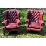 Pair red leather armchair. 78 w x 101cm h.Condition ReportGood condition.
