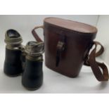 Vintage binoculars in leather case.Condition ReportSome wear to metal and writing to case interior.