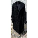 A vintage curly Persian lamb coat. 56cm under arm to arm.Condition ReportGood condition.