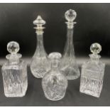 Five cut glass decanters. Tallest 37cm. One with etched lion to base.Condition ReportAll in good