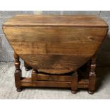 An oak drop leaf table. 137 w x 100cm extended. 73cm h.Condition ReportWatermarks to top.