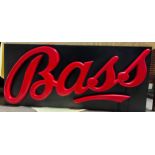 A large plastic Bass beer sign. 66 x 147cm.Condition ReportSlight nibbles in places.