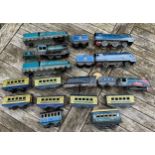 Tin plate clockwork train and carriages to include Merlin 60027 x 2, Dominion of Canada 4491,