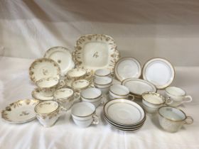 A selection of 19thC gold and white ceramics to include a Worcester Barr & Barr Flight 1807-1815