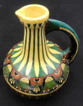 Decorative pottery jug Faience de Purmerende Hollande, numbered 1023 to the base. 18cm h.Condition