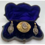 Victorian brooch and earrings; the brooch with glass panel to rear; all in original fitted leather