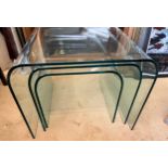 A nest of heavy glass mid century tables. Largest 50 x 55 x 46cm h.Condition ReportGood condition