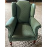 A green upholstered armchair on mahogany cabriole legs.Condition ReportGood condition.