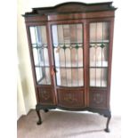 An Edwardian mahogany inlaid display cabinet with leaded glass door. 170 h x 108 w x 39cm d.