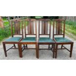 Four oak chairs with Masonic symbols.Condition ReportGood.