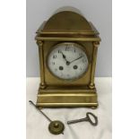 A French brass mantle clock, enamel face, movement marked Japy Freres GDE.MED.D. HONNEUR, has