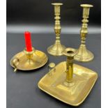 Brass 19thC to include a pair of heavy candlesticks with pushers 24cm h and two chambersticks, one