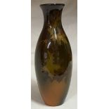 American Rookwood Vase with a brown glaze depicting leaves, 30cms high.Condition ReportFairly good