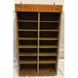 Matchbox Toys wall mounted display shelf, pine cased, 6 height with Matchbox advertising panel. 12