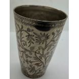 An Indian metal beaker. 11.5cm h with etched decoration.Condition ReportSome wear to plate.