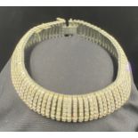 Esha Randel Art Deco collar, set throughout with clear paste, stamped "ESHA RANDEL". Repair needed.